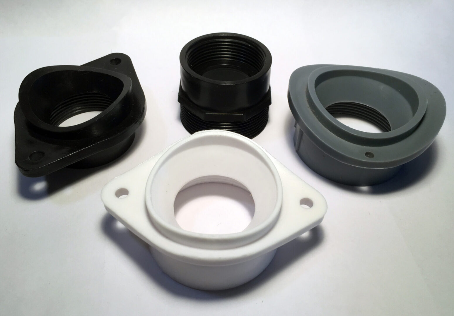 A group of different types of plastic parts.